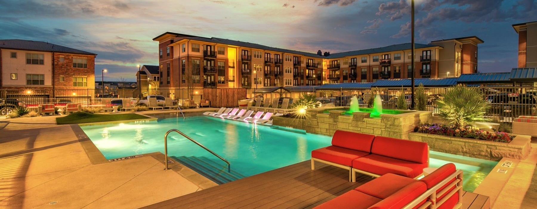 a pool with a building in the background