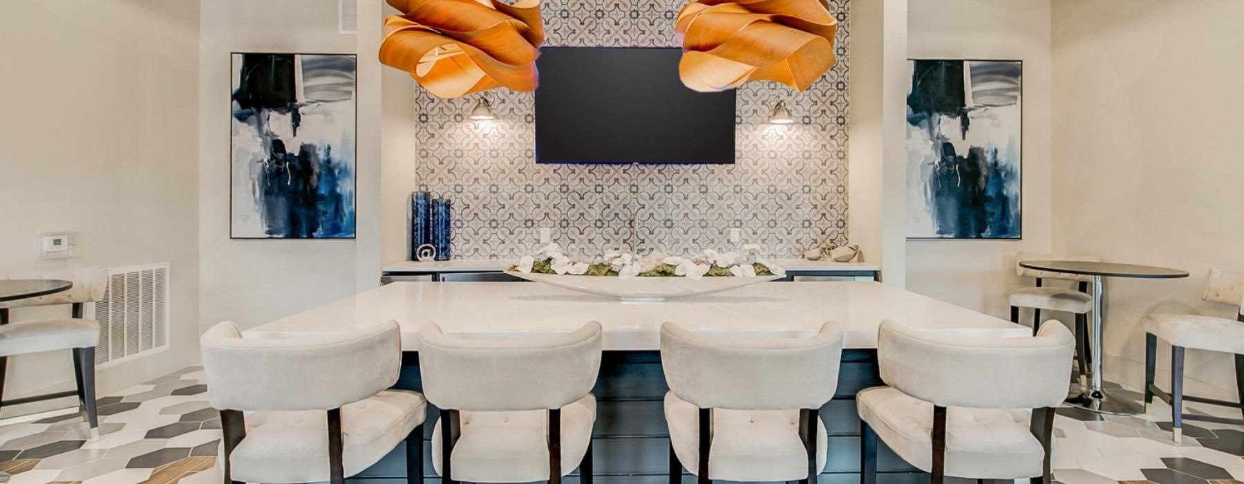a kitchen with a table and chairs